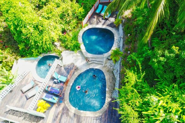 Fond Doux Resort Pool Area - fair travel with eco suites